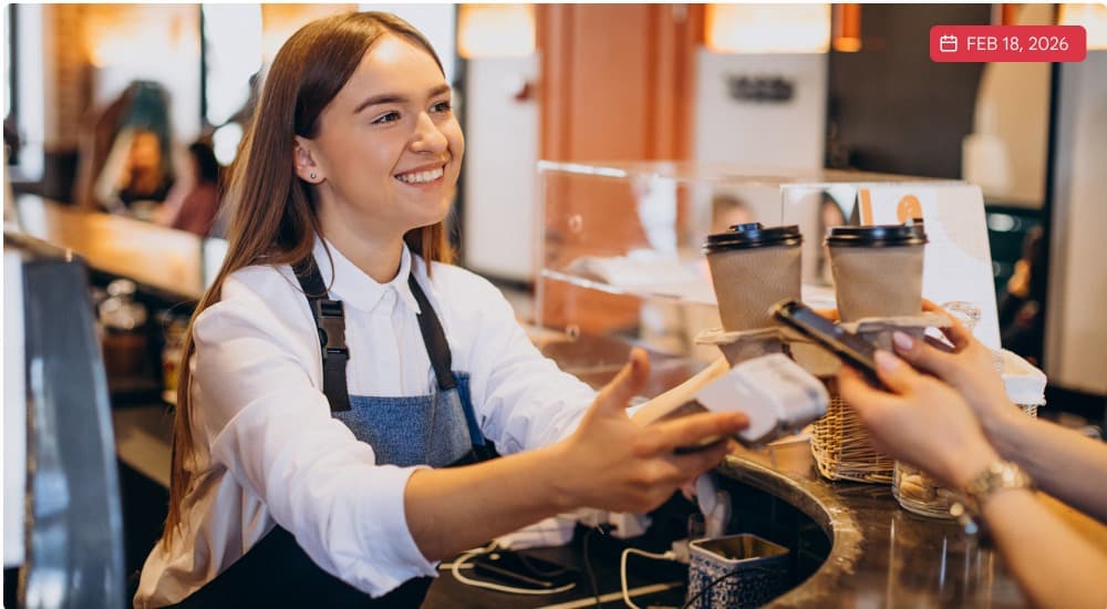 Restaurant team member serving a customer at the counter